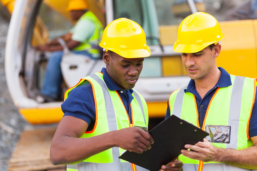 construction co-workers discussing about work plan construction