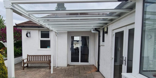 Aesthetic Veranda Installation Wales Bespoke Design Around Drainage Pipe Canopy Pro Ltd