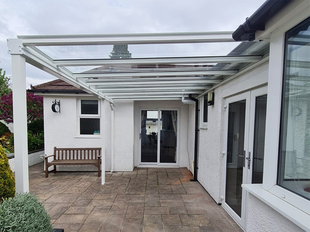 Aesthetic Veranda Installation Wales Bespoke Design Around Drainage Pipe Canopy Pro Ltd