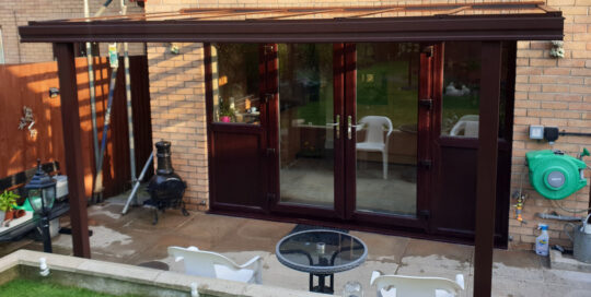 Milwood Group Installation Of Chocolate Brown Veranda In Wales Installed By Greenspace Living