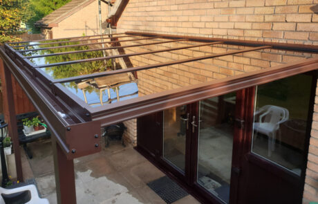 Milwood Group Installation Of Chocolate Brown Veranda In Wales Installed By Greenspace Living