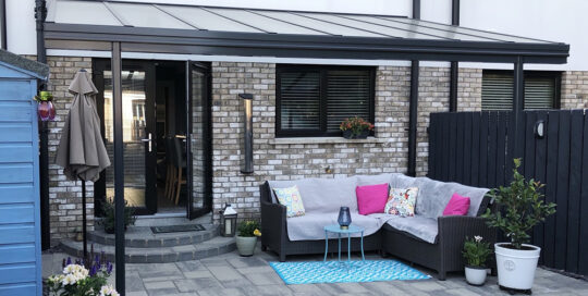 Stunning Veranda Installation featuring inset standing legs for robust design in Northern Ireland, installed by our Trade Partner Getty Glass